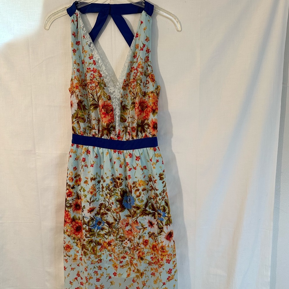 Sleeveless and backless floral dress by VO jeans size M